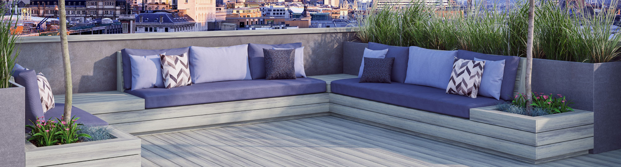 Luxury light grey Voyage decking, with an L shaped sofa.
